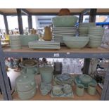 ORIENTAL GREEN GLAZED DINNER WARE ON 2 SHELVES