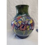 MOORCROFT GREEN GROUND VASE WITH ORCHID PATTERN,