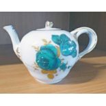 AN 18TH OR 19TH CENTURY MEISSEN PORCELAIN LIDDED TEAPOT DECORATED WITH GREEN & GOLD FLORAL