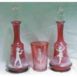 PAIR OF MARY GREGORY STYLE ENAMEL DECORATED CRANBERRY GLASS DECANTERS,