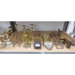 SELECTION OF SILVER PLATED TOAST RACKS, METAL DOG NUT CRACKER, BRASS CANDLESTICKS,