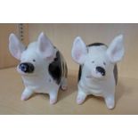 TWO BLACK AND WHITE WEMYSS PIGS - 16CM LONG Condition Report: One of the pigs has a