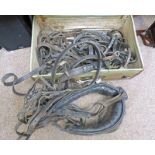 CANVAS TRUNK WITH CONTENTS OF A GOOD AND VAST SELECTION OF HORSE HARNESSES AND BITS