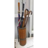 METAL BOUND STICK STAND WITH CONTENTS TO INCLUDE RIDING WHIP, CANES,
