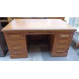 MID 20TH CENTURY OAK TWIN PEDESTAL DESK OF SEVEN DRAWERS