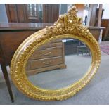 GILT FRAMED OVAL MIRROR - 91 X 98CM