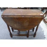 EARLY 20TH CENTURY OAK GATELEG TABLE ON TURNED SUPPORTS