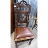 LATE 19TH CENTURY OAK CHAIR WITH DECORATIVE CARVED BACK ON TURNED SUPPORTS