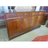 20TH CENTURY MAHOGANY SIDE CABINET WITH 2 SHORT AND 1 LONG DRAWER OVER 4 PANEL DOORS LENGTH 172CM