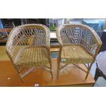 PAIR OF EARLY 20TH CENTURY CHILDREN'S WICKER TUB CHAIRS