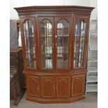 CABINET WITH 4 GLASS PANEL DOORS OVER 4 DOORS ON A PLINTH BASE - LENGTH 155CM