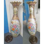 PAIR OF MODERN ORIENTAL VASES ON HARDWOOD STANDS,