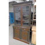 LATE 19TH CENTURY OAK BOOKCASE WITH 2 GLAZED DOORS OVER 2 DRAWERS & 2 PANEL DOORS 226CM TALL - PLUS