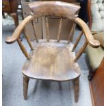 EARLY 20TH CENTURY CAPTAINS ARMCHAIR ON TURNED SUPPORTS