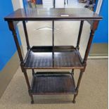 19TH CENTURY MAHOGANY BOOKCASE WITH TURNED SUPPORTS.