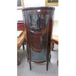 MAHOGANY GLASS FRONTED CABINET WITH BOWED GLASS DOOR & SHAPED SIDES.