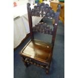 18TH CENTURY OAK AND ELM CHAIR WITH CARVED DECORATIONS AND TURNED SUPPORTS