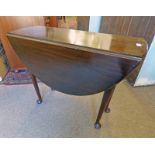 MAHOGANY DROP LEAF , PAD FOOT TABLE .