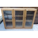 ERCOL BOOKCASE WITH 3 GLAZED PANEL DOORS
