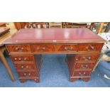 20TH CENTURY MAHOGANY DESK WITH CENTRAL DRAWER FLANKED BY 4 DRAWERS ON EACH SIDE WITH LEATHER