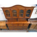 MAHOGANY BOOKCASE WITH 4 GLAZED PANEL DOORS OVER BASE WITH 4 DRAWERS OVER 4 PANEL DOORS ON BURGER