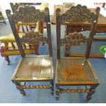 PAIR 18TH CENTURY OAK AND ELM CHAIRS WITH CARVED DECORATION AND LATER RENOVATIONS