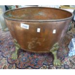 COPPER LOG BIN ON BRASS LION PAW FEET Condition Report: 43cm across. 30cm tall.