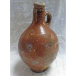 18TH OR 19TH CENTURY STONEWARE BELLARMINE JUG WITH DECORATION 27CM TALL