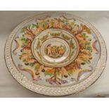 CAPODIMONTE CIRCULAR WALL PLAQUE DECORATED WITH FOLIAGE AND CLASSICAL FIGURES,