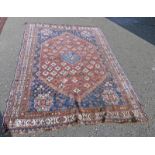 RED AND BLUE GROUND MIDDLE EASTERN RUG 215 X 165 CM Condition Report: Fading present.