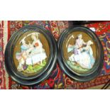 PAIR OF OVAL PORCELAIN FIGURE GROUPS