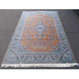 EASTERN CARPET DECORATED WITH BLUES AND BROWNS 171 X 240CM