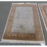 CREAM GROUND MIDDLE EASTERN RUG,