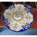 LATE 19TH OR EARLY 20TH CENTURY MAJOLICA STYLE CHARGER DECORATED WITH CHERUBS