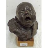 BRONZE FIGURE OF A CRYING BABY ,