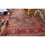 RED GROUND MIDDLE EASTERN CARPET WITH ALL OVER DESIGN 390 X 300 CM Condition Report: