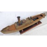 MODEL BOAT ON STAND Condition Report: 61cm long. 11cm across.
