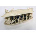 19TH CENTURY CARVED IVORY SHELL WITH ORIENTAL VILLAGE SCENE Condition Report: 147.