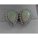 PAIR OF OPAL & DIAMOND CLUSTER EARRINGS EACH PEAR SHAPED OPAL SET WITHIN A SURROUND OF 18 BRILLIANT