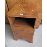 EARLY 20TH CENTURY WALNUT BEDSIDE CABINET WITH SLIDE OVER SINGLE DRAWER OVER PANEL DOOR ON BRACKET