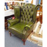 GREEN LEATHER BUTTON WINGBACK ARMCHAIR ON QUEEN ANNE SUPPORTS 105 CM TALL