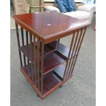 MAHOGANY REVOLVING BOOKCASE .