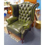 GREEN LEATHER BUTTON WINGBACK ARMCHAIR ON QUEEN ANNE SUPPORTS 105 CM TALL