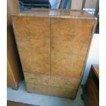 EARLY 20TH CENTURY WALNUT CABINET WITH 2 PANEL DOORS OVER 2 DRAWERS.