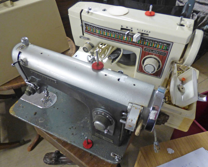 ATLANTIS SEWING MACHINE AND A UNIVERSAL SEWING MACHINE -2-