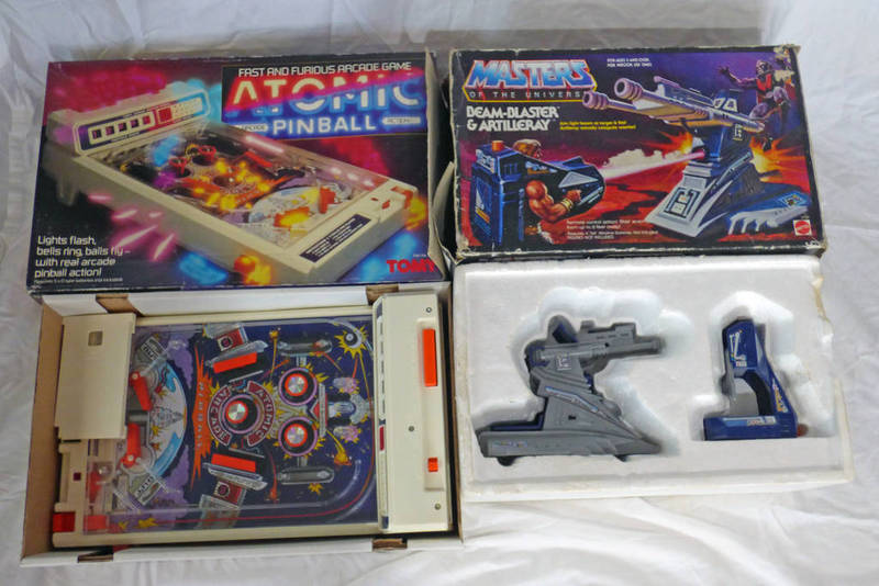 MASTERS OF THE UNIVERSE BEAM-BLASTER & ARTILLERARY FROM MATTEL TOGETHER WITH TOMY ATOMIC PINBALL
