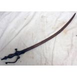 INDIAN TULWAR WITH LONG SINGLE EDGED BLADE OF CHARACTERISTIC SHAPE WITH ITS IRON ONE PIERCE GRIP OF