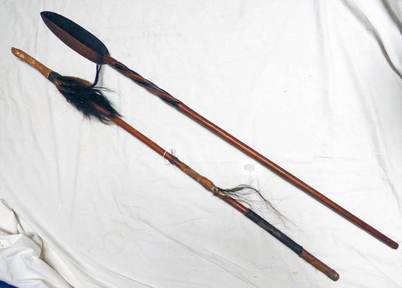 AFRICAN WOODEN SPEAR SHAPED STAFF WITH TWIST DECORATION.