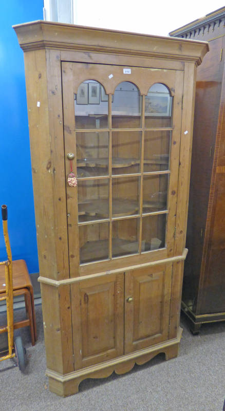 PINE CORNER CABINET WITH ASTRAGAL GLASS PANEL DOOR OVER 2 PANEL DOORS WIDTH 98CM X HEIGHT 194CM