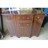 LATE 19TH CENTURY MAHOGANY SIDEBOARD WITH SHAPED FRONT AND 2 SHORT OVER 3 LONG DRAWERS FLANKED BY